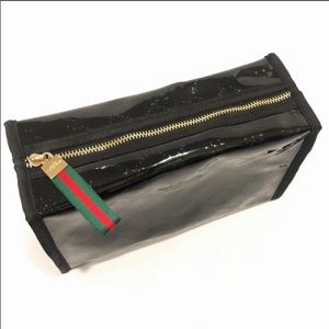 GUCCI large makeup/travel bag with Gucci Monogram.